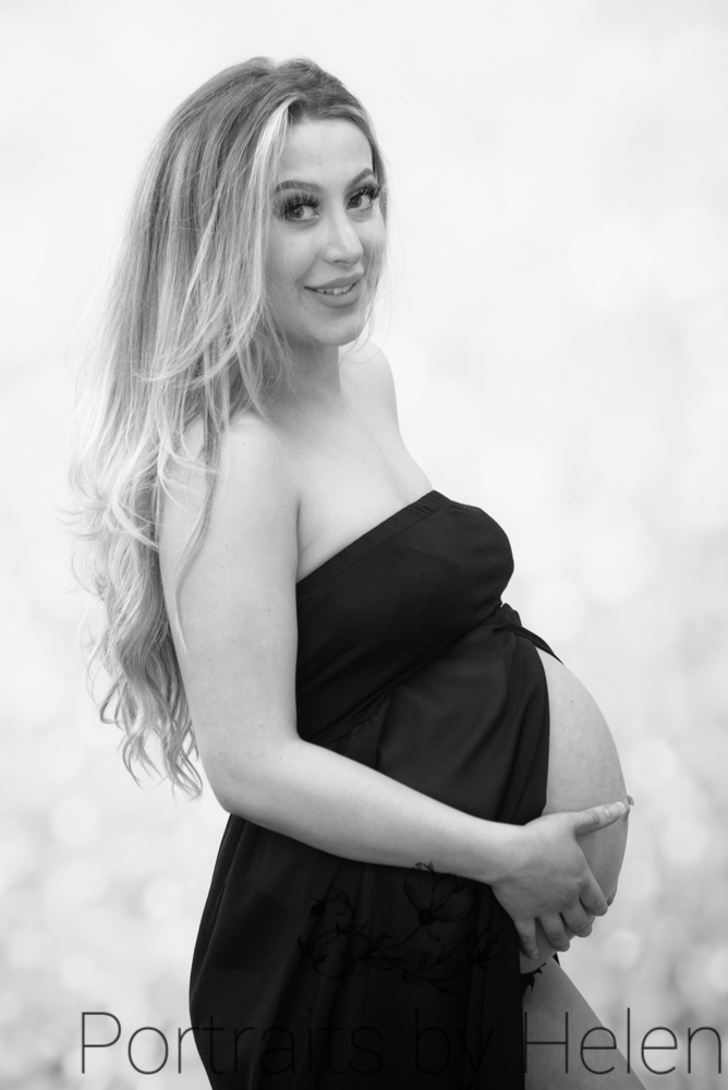Posing in maternity dress, maternity  portraits Lake District