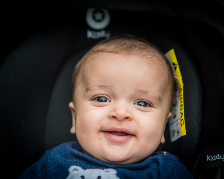 Baby smiles, outdoor family portraits