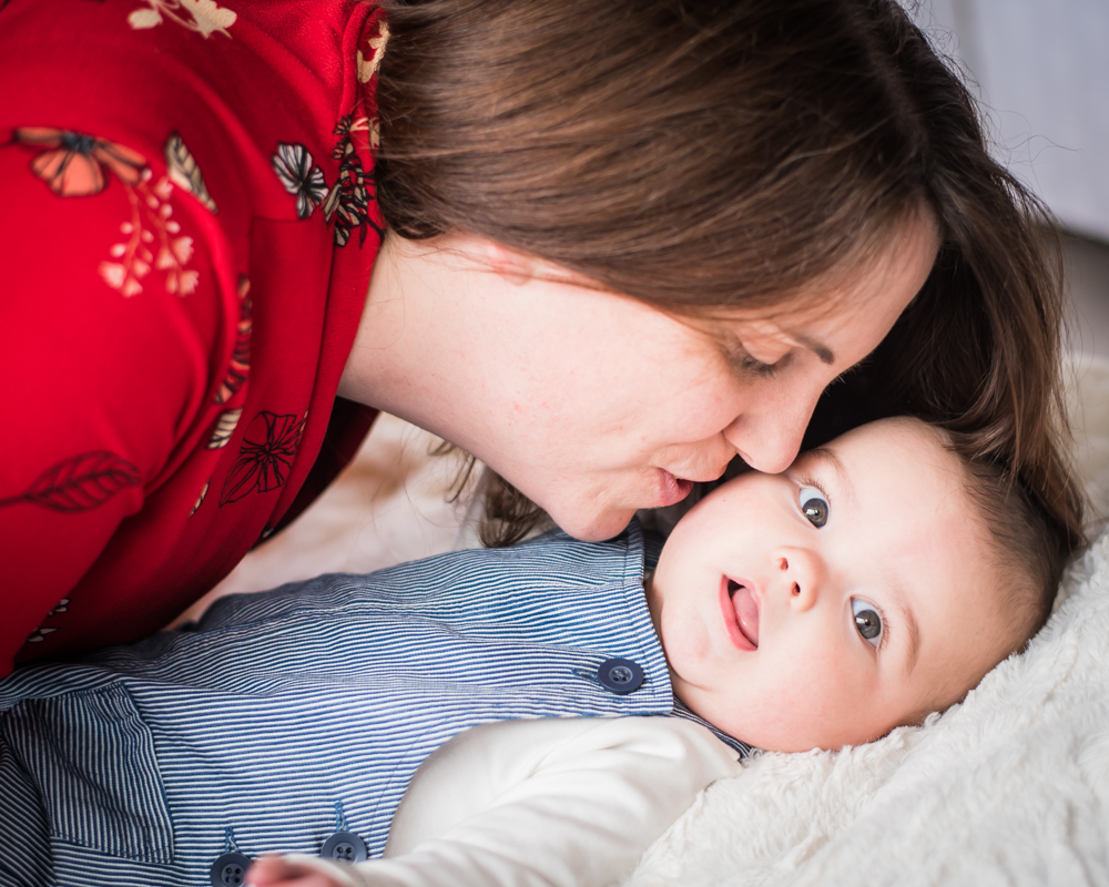 Mum kisses, baby photographer Cockermouth