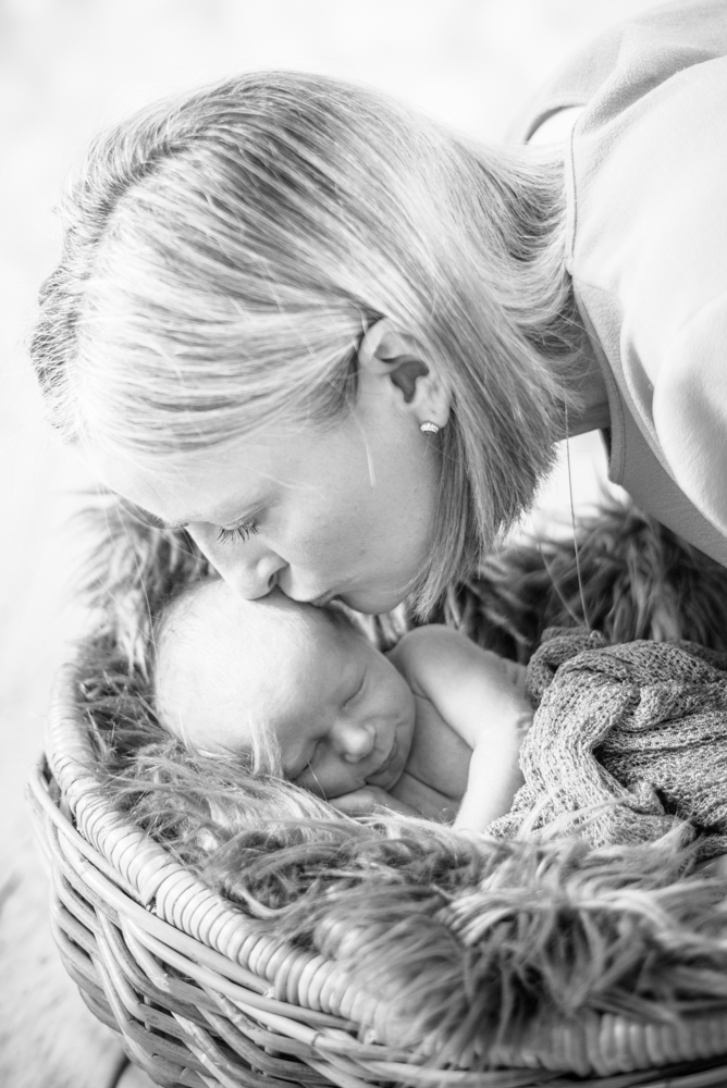 Mum kissing baby, newborn photographer Carlisle