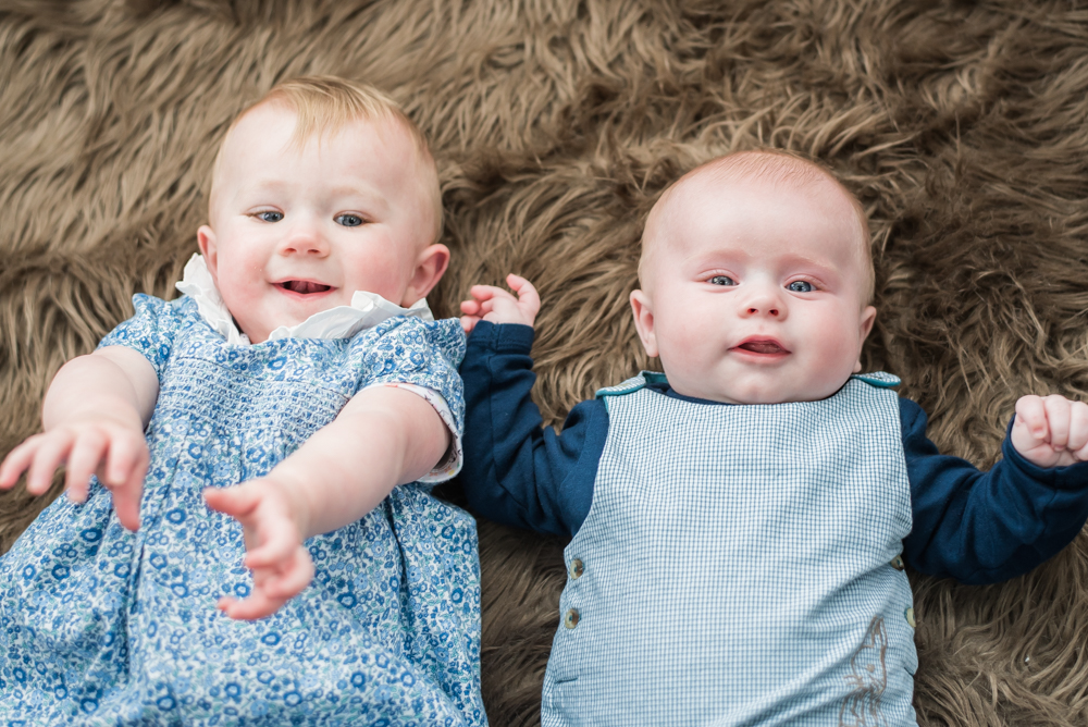 Cousins lying down together, Carlisle baby photographer
