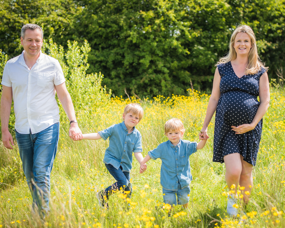 Walking in wildflowers, maternity photographer Maryport