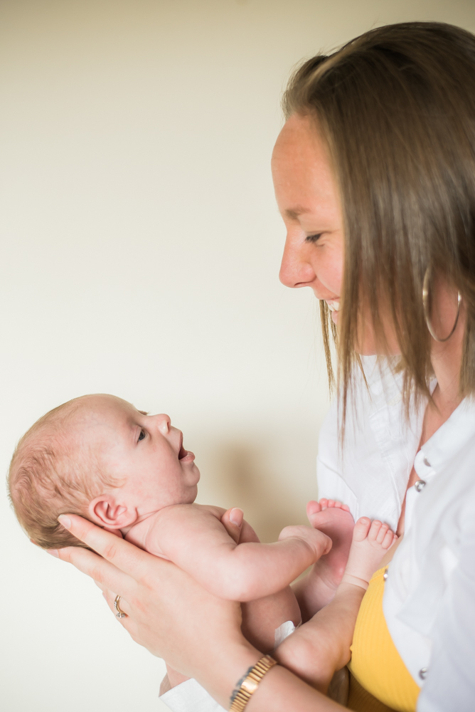 Mum laughing with baby, Carlisle newborn portraits
