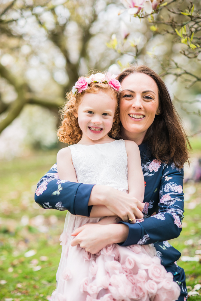 Esme and Mum cuddling in blossom, Wigton baby photographer