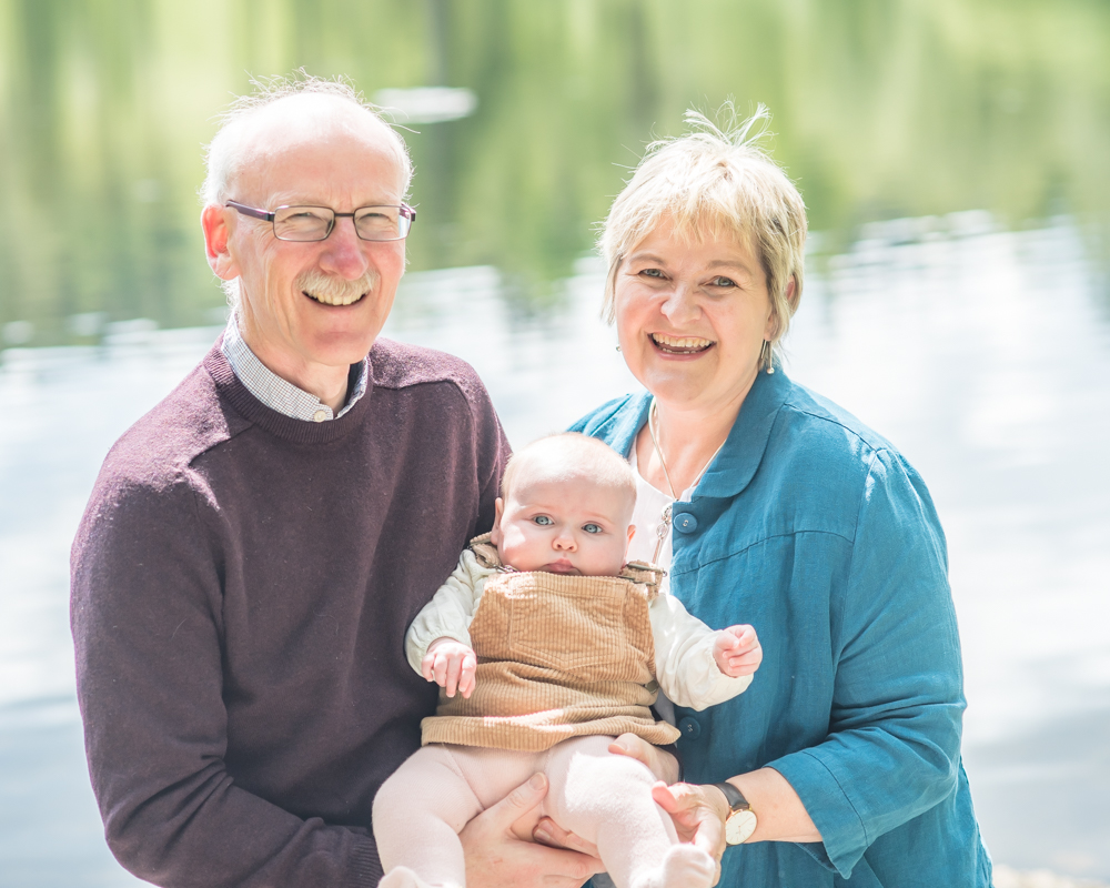 Granparents with baby, family portraits Maryport
