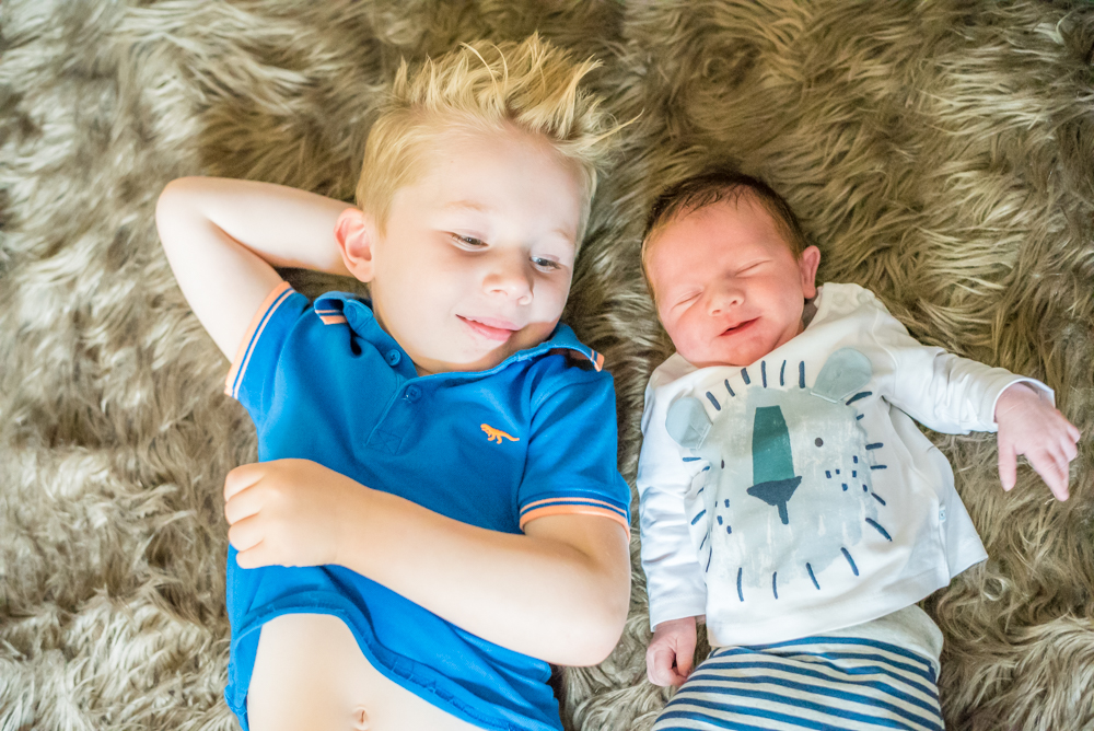 Joshua and baby brother Oliver, newborn photographer Cumbria