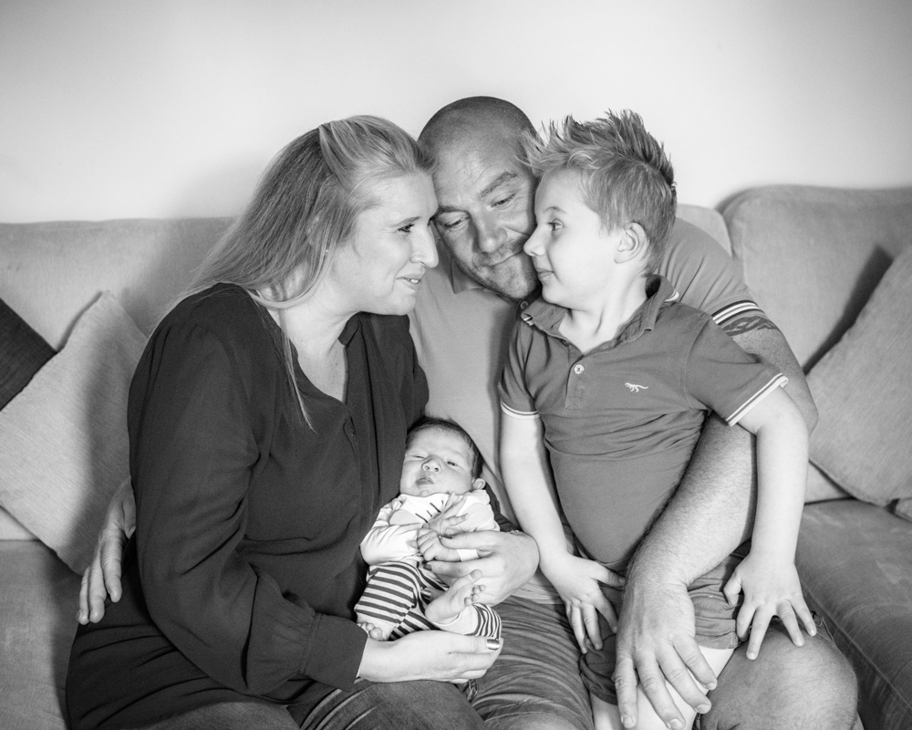Smiling family cuddles, Carlisle photographers
