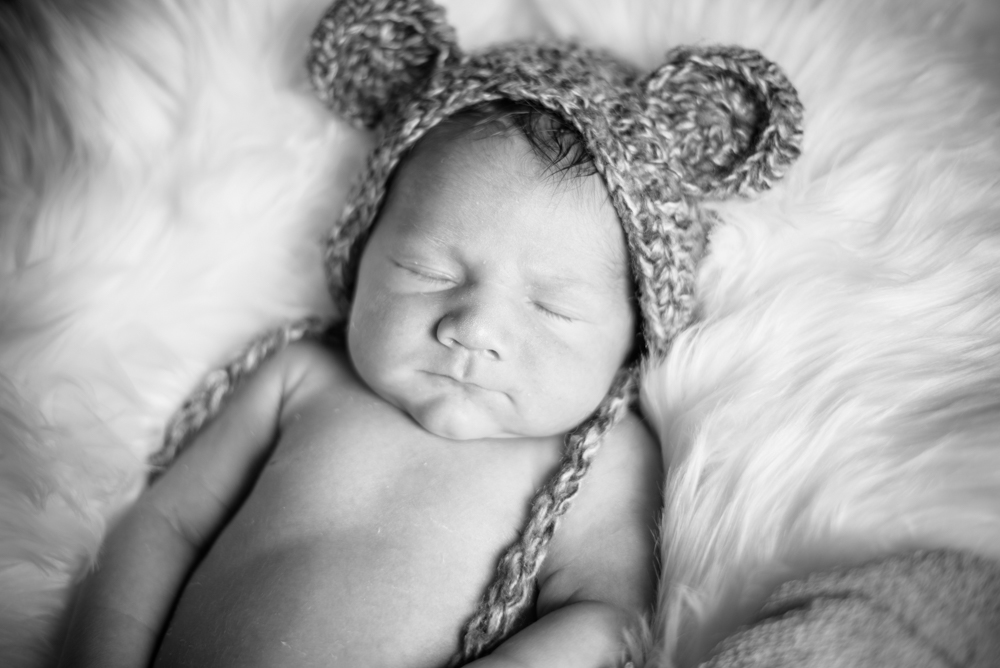 Sleepy baby posing, newborn photographer Wigton