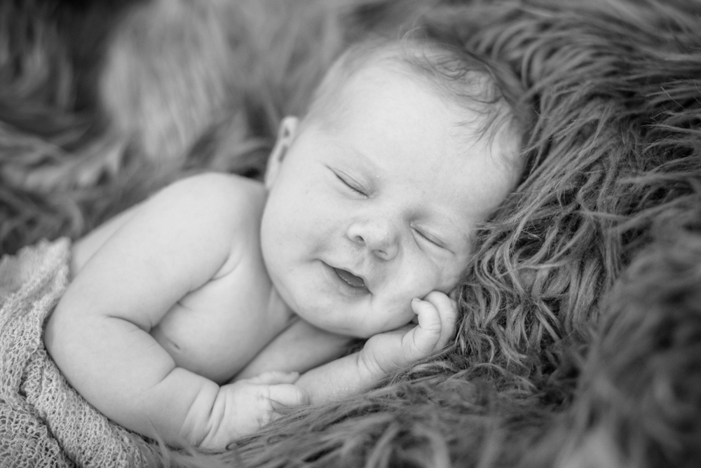 Smiley newborn photographs, baby photographers Workington