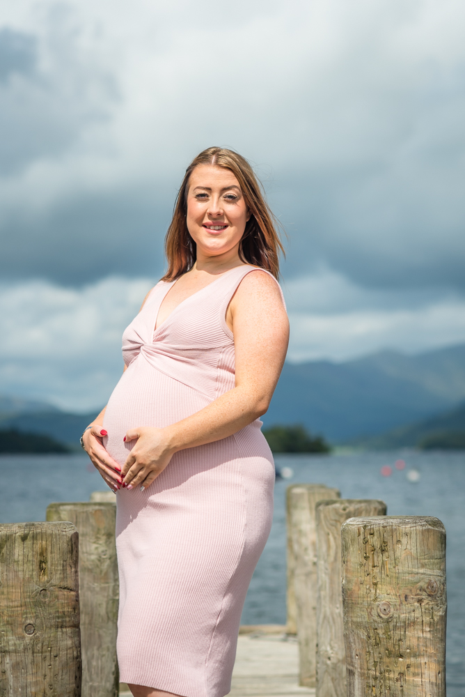 Charlotte on the jetty at Windermere, maternity portraits Cumbria