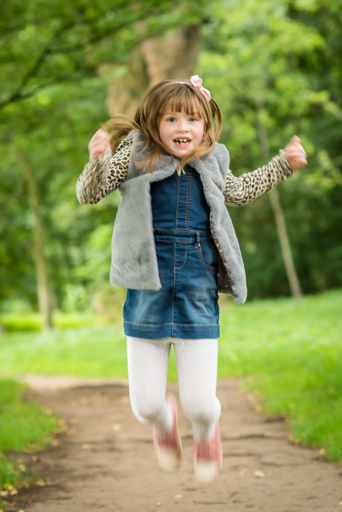 Jumping Megan, baby portraits Lake District